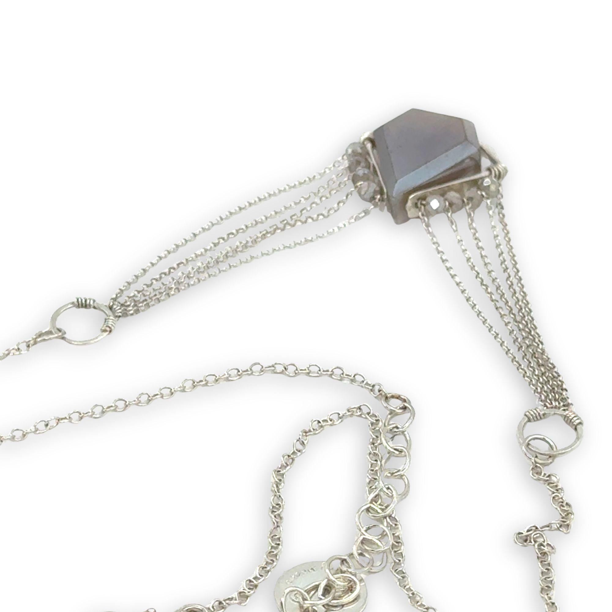 pointed moonstone in a sterling silver mini pendant necklace with multi chains onto handmade sterling silver rings