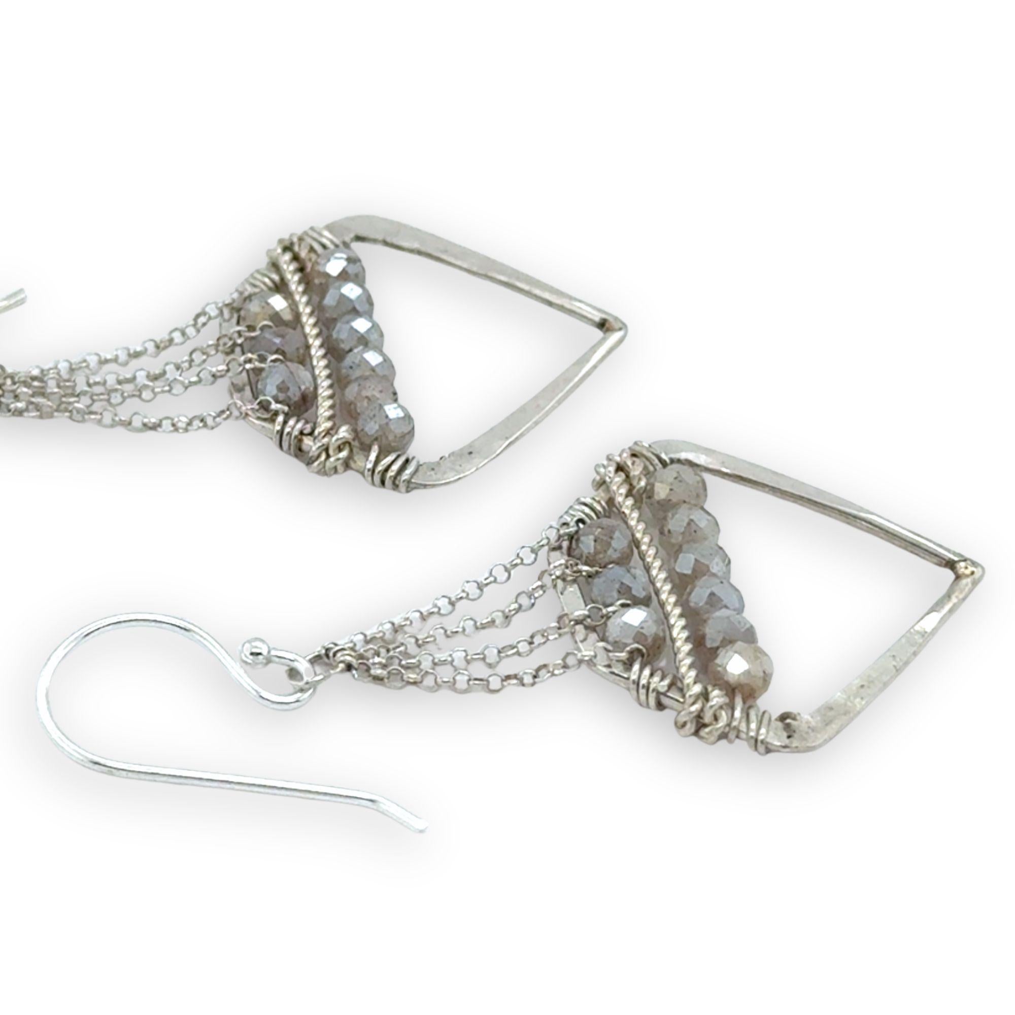 Pair of silver geometric sterling silver earrings with moonstones on delicate sterling silver chain
