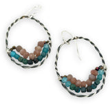 darkened sterling silver twisted hoop earrings with pyrite, mauve moonstone, and chrysocolla faceted gemstones