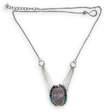 Mauve moonstone nugget pendant surrounded by pyrite and chrysocolla cube gemstones with multi layered chain webbing necklace