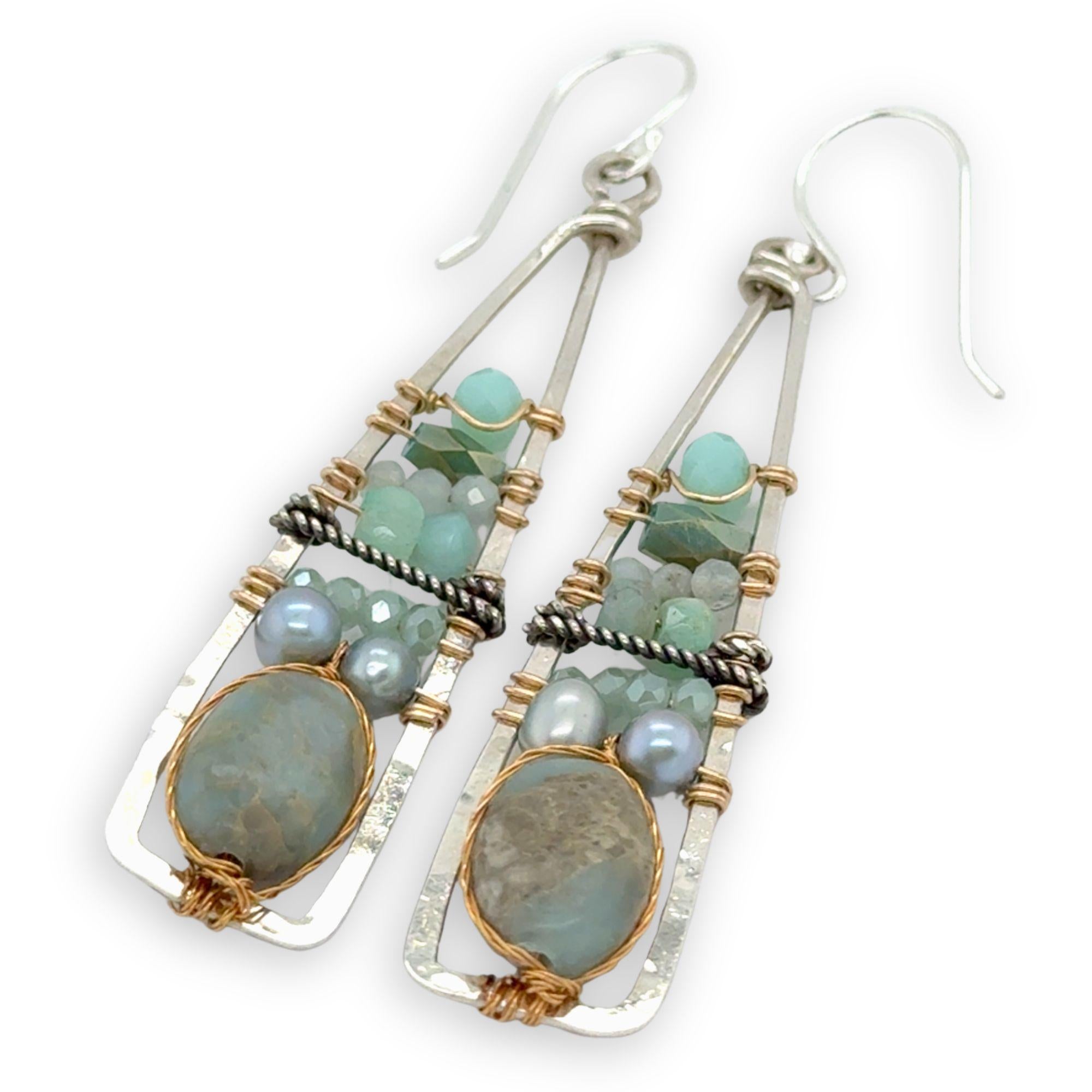 Terra verde smooth oval gemstones layered with light blue fresh water pearl, crystal, and amazonite gemstones on gold filled wire within skinny triangle shaped earrings
