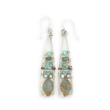 Terra verde smooth oval gemstones layered with light blue fresh water pearl, crystal, and amazonite gemstones on gold filled wire within skinny triangle shaped earrings