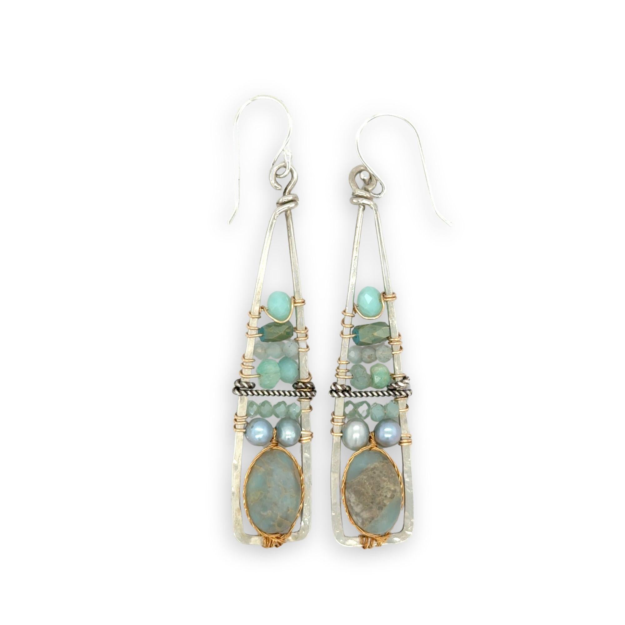 Terra verde smooth oval gemstones layered with light blue fresh water pearl, crystal, and amazonite gemstones on gold filled wire within skinny triangle shaped earrings