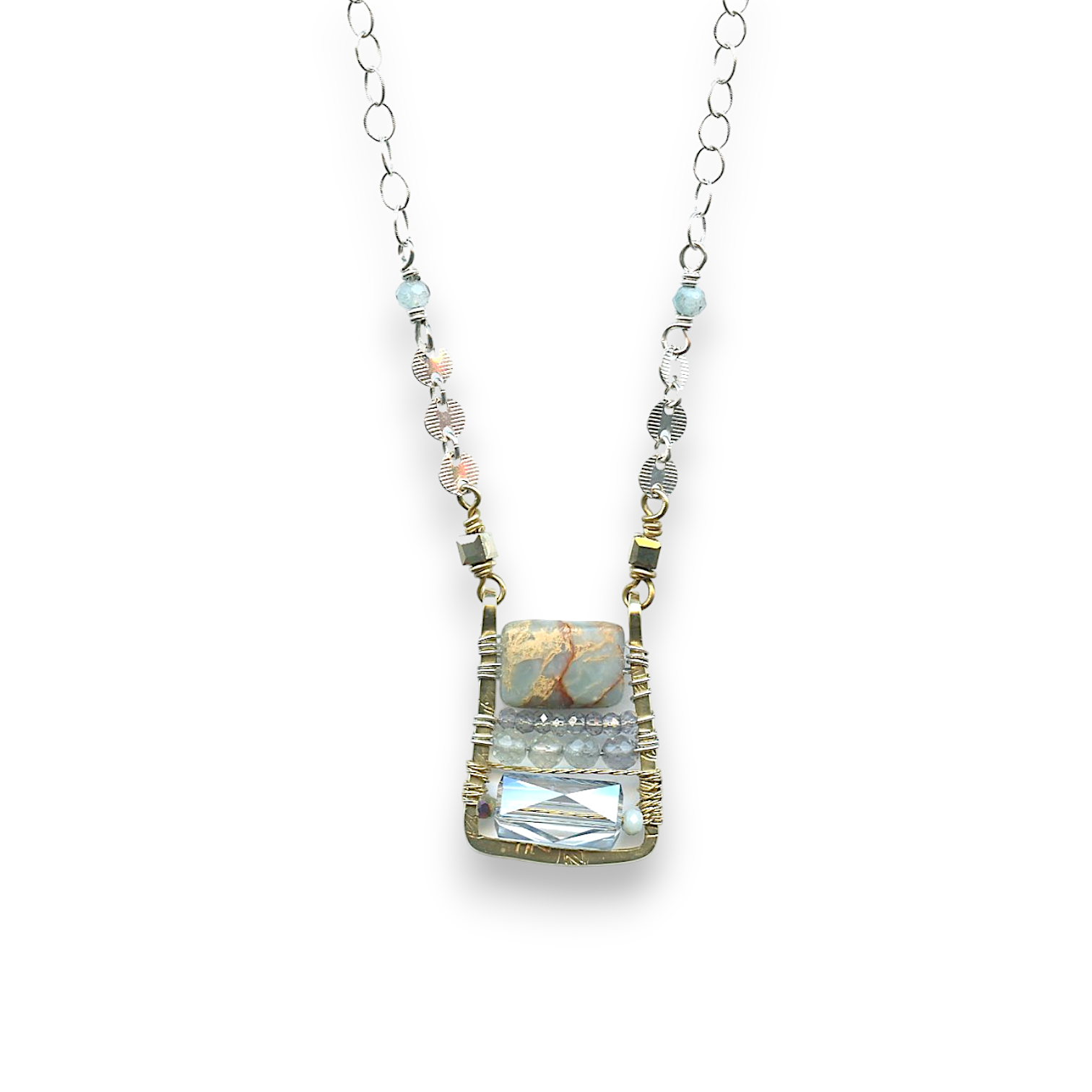 crystal, apatite, blue quartz, and terra verde jasper gemstones stacked on top of each other in a brass box mini pendant necklace on sterling silver delicate chain