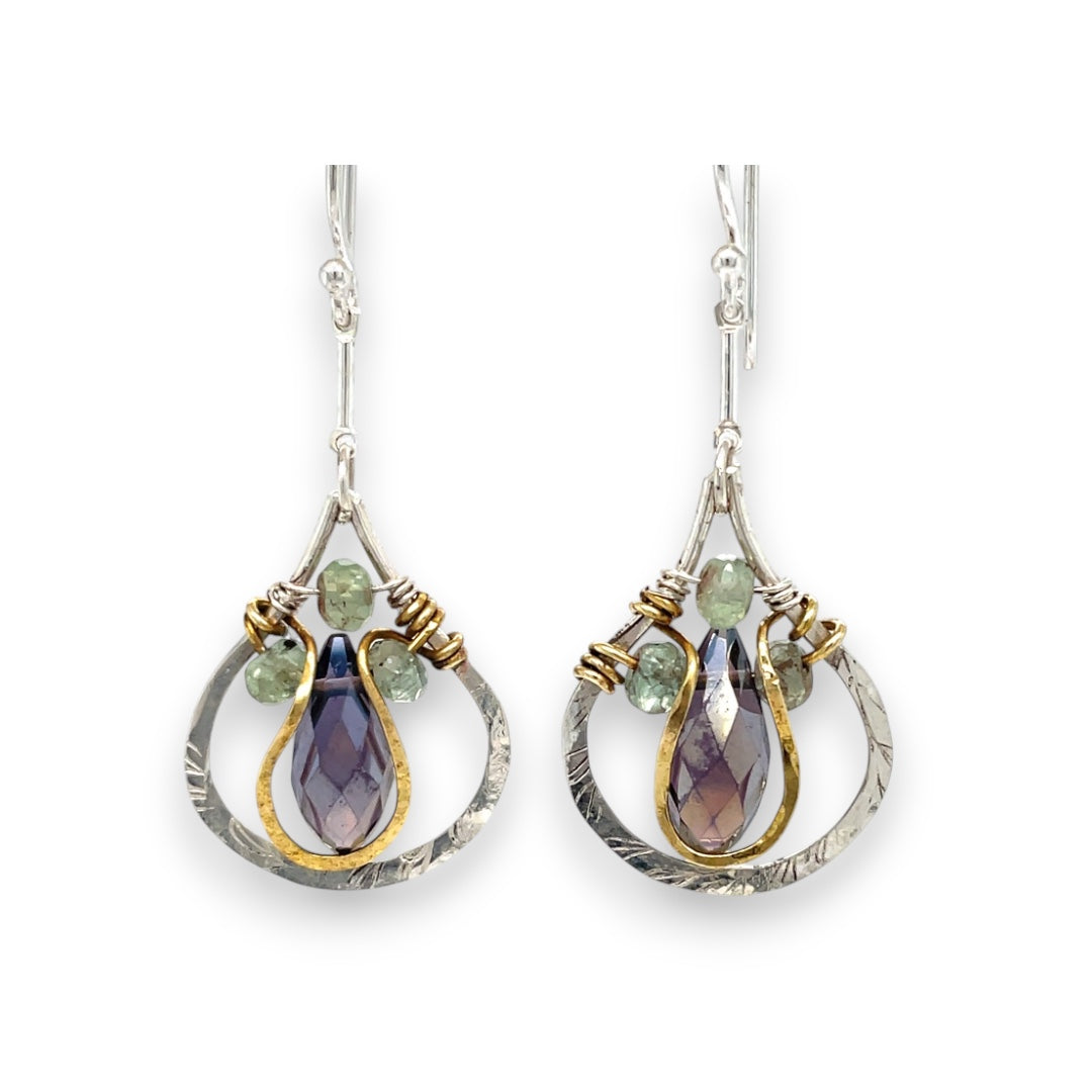 Sterling silver leaf stamped drop earrings with green kyanite gemstones and purple crystal drops wrapped in hammered brass wire, on sterling silver bar chain