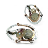 A pair of sterling silver and bronze hammered earrings with smooth prehnite coin and watermelon tourmaline gemstones, with built in earring hooks to wear like a post earring.