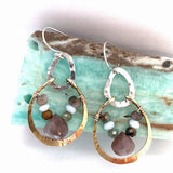 mauve moonstone and opal faceted gemstones held within a brass hammered ring hanging onto a sterling silver teardrop link mini earrings