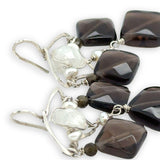 Smokey quartz tile and olive cat's eye gemstones hang from sterling silver triangle earrings filled with moonstone and fresh water pearl, featuring sterling silver earring hooks built in to wear like a post earring
