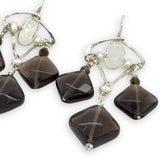 Smokey quartz tile and olive cat's eye gemstones hang from sterling silver triangle earrings filled with moonstone and fresh water pearl, featuring sterling silver earring hooks built in to wear like a post earring