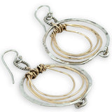 Pair of handmade hammered sterling silver and bronze layered mini hoops on a braided sterling link