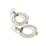 Pair of handmade hammered sterling silver and bronze layered mini hoops on a braided sterling link