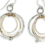 Pair of handmade hammered sterling silver and bronze layered mini hoops on a braided sterling link