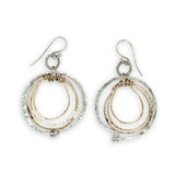 Pair of handmade hammered sterling silver and bronze layered mini hoops on a braided sterling link