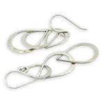 Triple handmade hammered sterling silver teardrops interlocked within each other to make a long earring