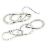 Triple handmade hammered sterling silver teardrops interlocked within each other to make a long earring
