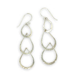Triple handmade hammered sterling silver teardrops interlocked within each other to make a long earring