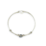 Delicate bracelet with a central labradorite flashy stone and silver fresh water pearl accents