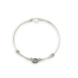Delicate bracelet with a central labradorite flashy stone and silver fresh water pearl accents
