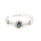 Delicate bracelet with a central labradorite flashy stone and silver fresh water pearl accents