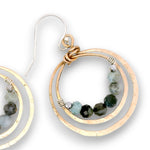 Bronze double hoop earrings lined with aquamarine and pyrite gemstones on sterling silver earring hooks