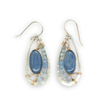 Sterling silver hammered drop earrings with smooth kyanite oval gemstones wrapped in gold fill wire surrounded by blue crystal, mini cat's eye, and blue lace agate gemstones