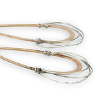 Bronze drop shaped earrings with sterling silver fine wire webbing on the bottom