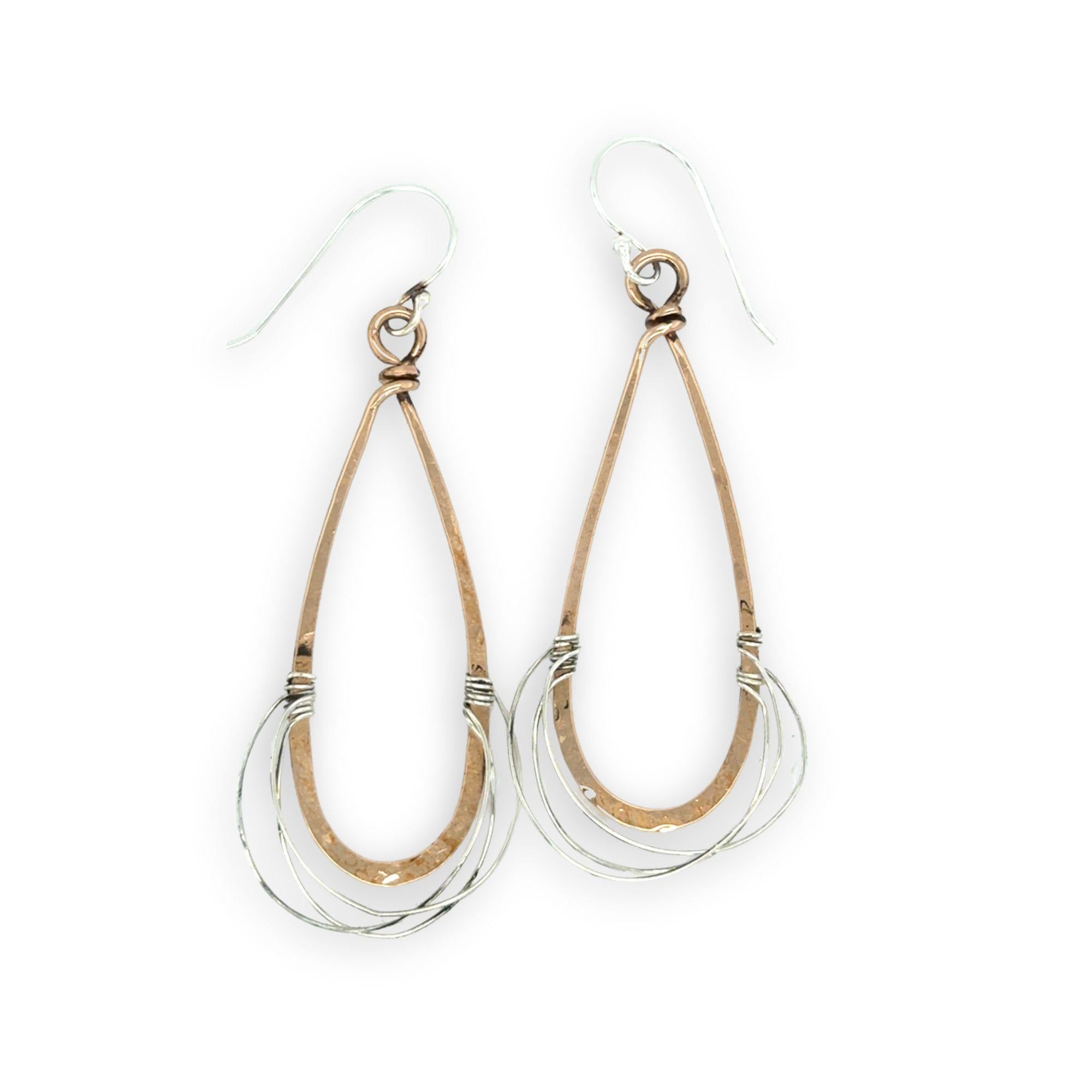 Bronze drop shaped earrings with sterling silver fine wire webbing on the bottom