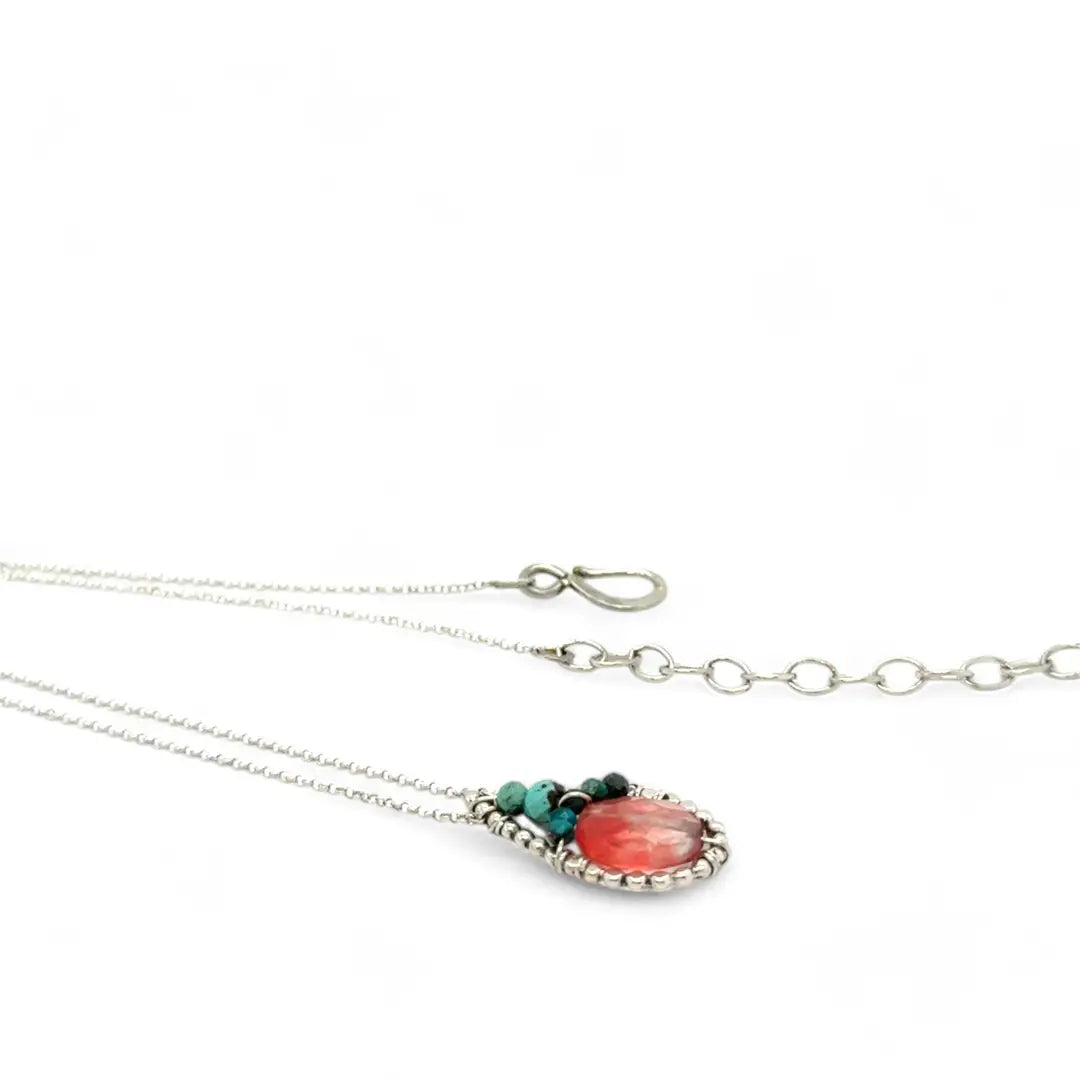 tiny teardrop shaped dot frame pendant with cherry quartz oval with turquoise and chrysocolla accents on a dainty sterling silver chain necklace