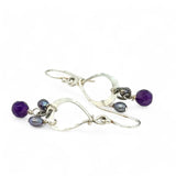 A pair of sterling silver mini drop earrings featuring faceted spherical amethyst and purple freshwater pearl accents