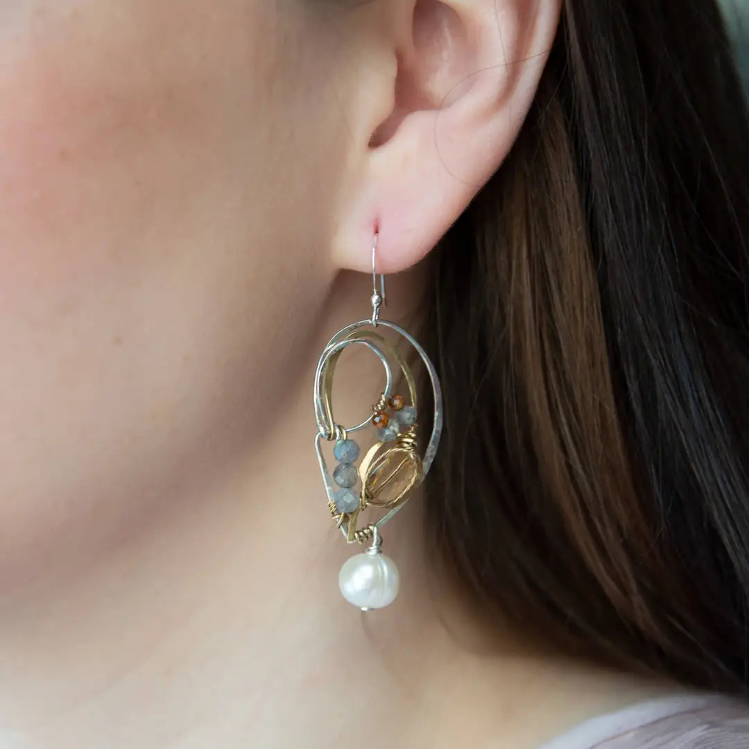 Citrine, labradorite and hessonite garnet gemstones held within sterling silver and brass earrings with a fresh water pearl drop