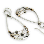 sterling silver handmade infinity shaped earrings with pyrite gemstones on gold filled wire