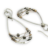 sterling silver handmade infinity shaped earrings with pyrite gemstones on gold filled wire