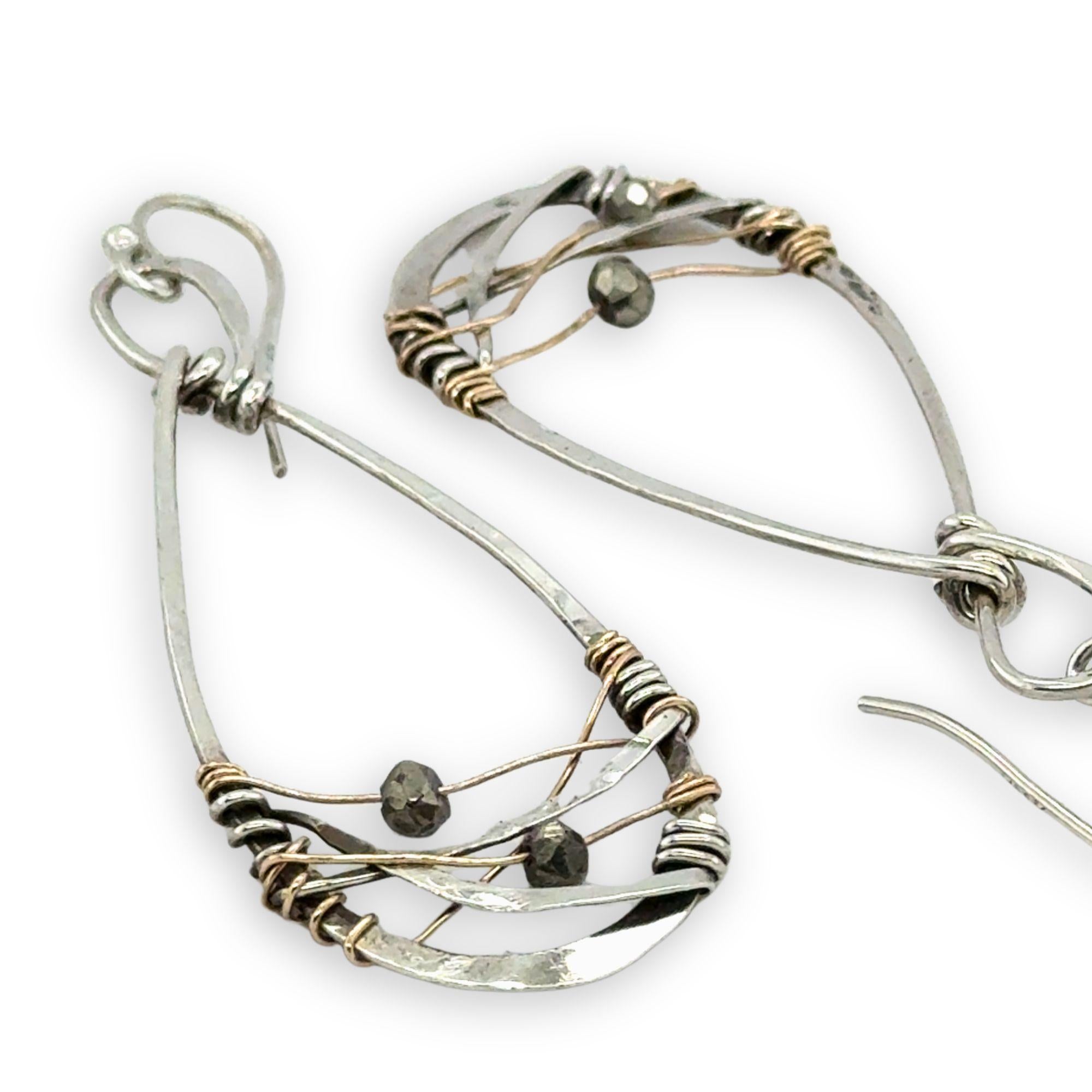 sterling silver handmade infinity shaped earrings with pyrite gemstones on gold filled wire