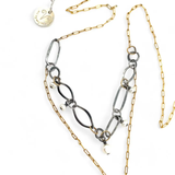 A gold-filled crinkle chain necklace with oxidized sterling silver handmade links, featuring moonstone faceted natural gemstone and tiny freshwater pearl charms