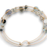 bronze double cuff with sterling silver hammered bars with aquamarine, moonstone, labradorite, apatite, and iolite gemstones