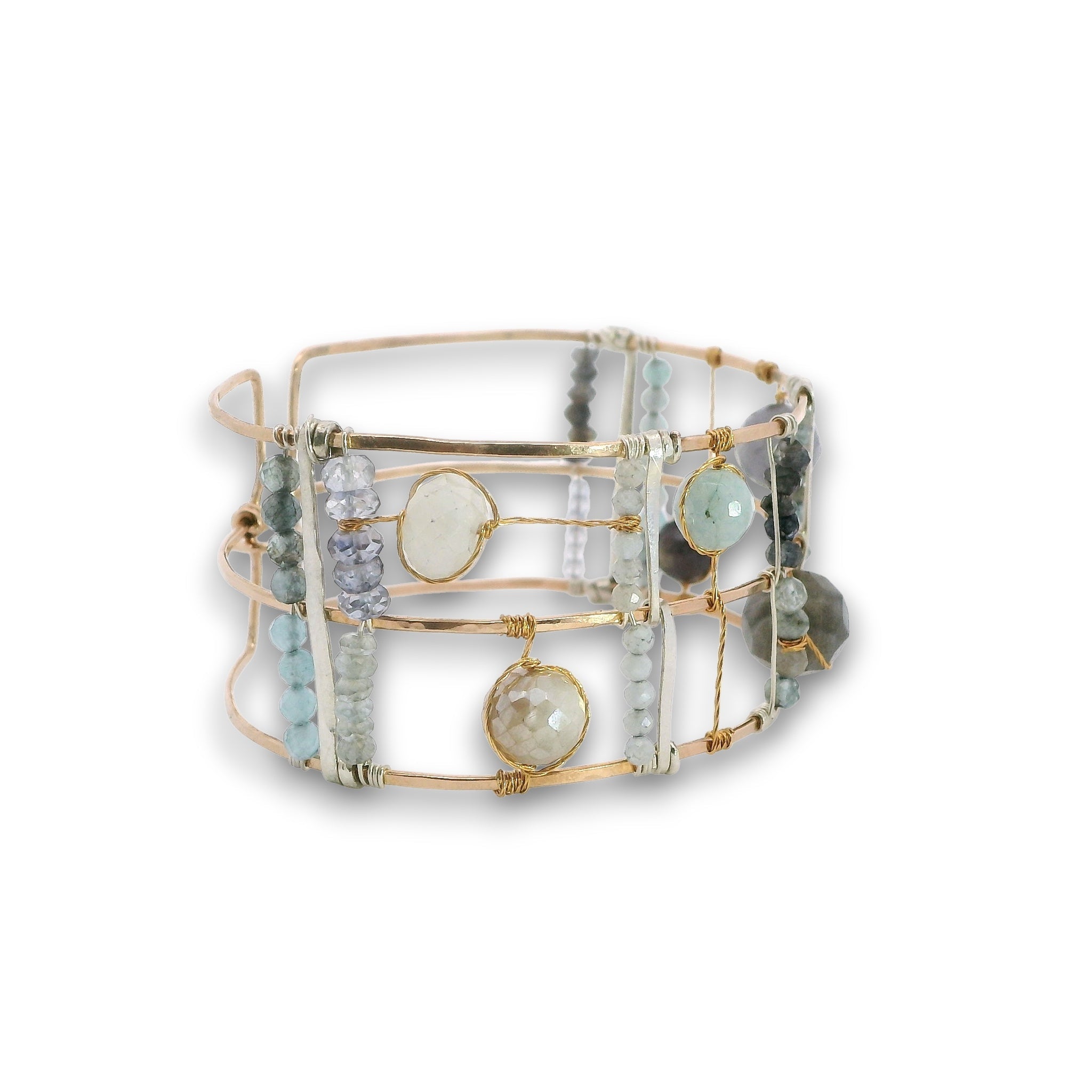 bronze double cuff with sterling silver hammered bars with aquamarine, moonstone, labradorite, apatite, and iolite gemstones