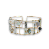 bronze double cuff with sterling silver hammered bars with aquamarine, moonstone, labradorite, apatite, and iolite gemstones