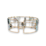 bronze double cuff with sterling silver hammered bars with aquamarine, moonstone, labradorite, apatite, and iolite gemstones