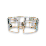 bronze double cuff with sterling silver hammered bars with aquamarine, moonstone, labradorite, apatite, and iolite gemstones