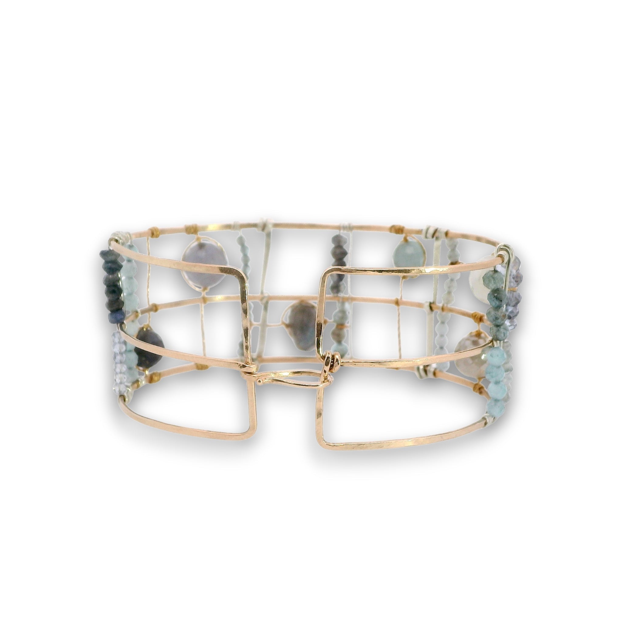 bronze double cuff with sterling silver hammered bars with aquamarine, moonstone, labradorite, apatite, and iolite gemstones
