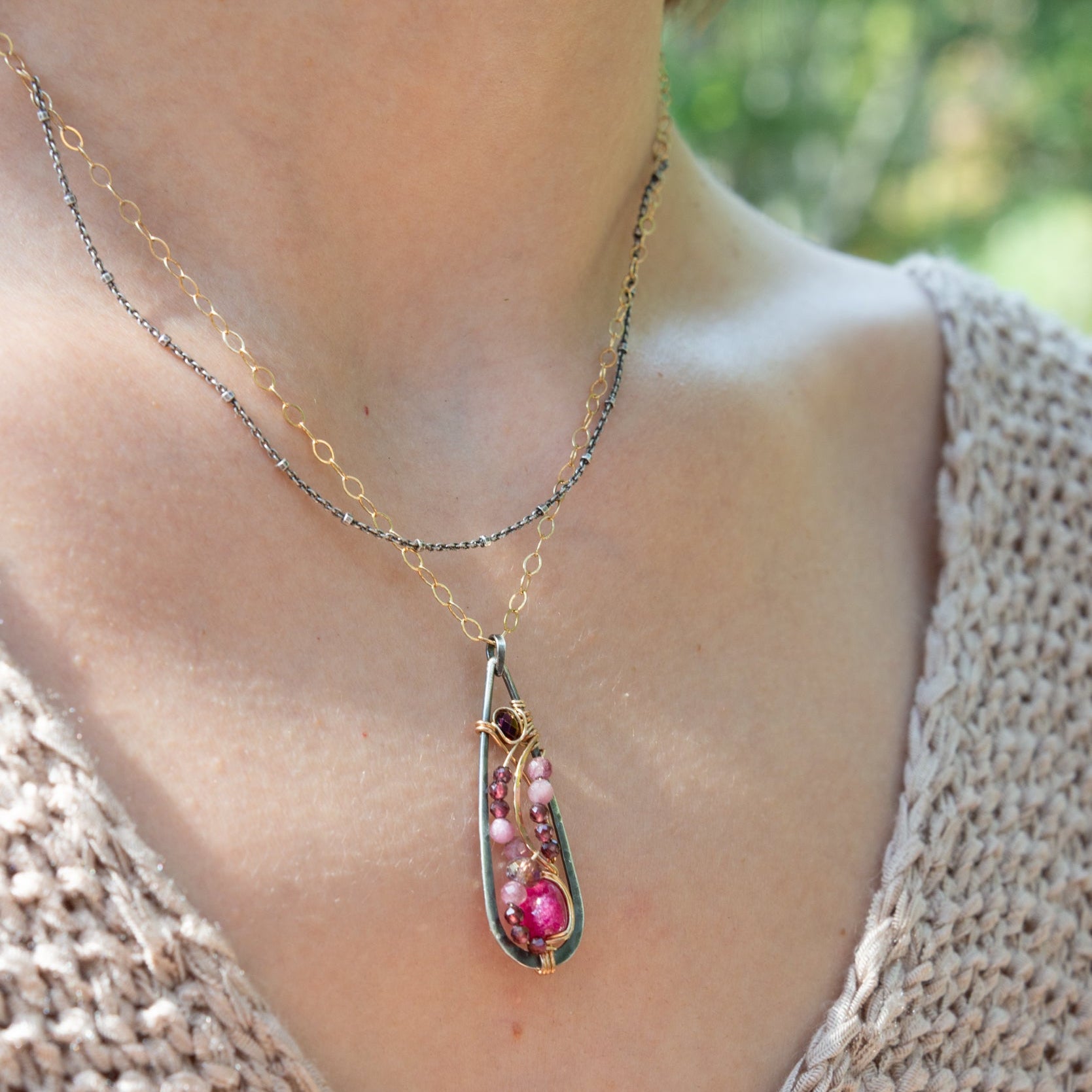 Handmade oxidized sterling silver pendant necklace with a ruby nugget, pink tourmaline and garnet gemstones, by Art by any Means Jewelry