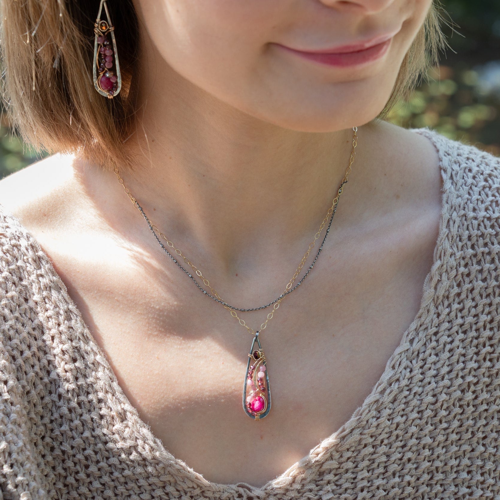 Handmade oxidized sterling silver pendant necklace with a ruby nugget, pink tourmaline and garnet gemstones, by Art by any Means Jewelry