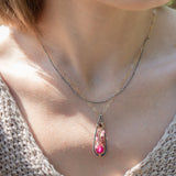Handmade oxidized sterling silver pendant necklace with a ruby nugget, pink tourmaline and garnet gemstones, by Art by any Means Jewelry