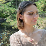 Handmade oxidized sterling silver pendant necklace with a ruby nugget, pink tourmaline and garnet gemstones, by Art by any Means Jewelry