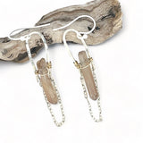 Handmade Formations Quartz Earrings with natural quartz points on hand formed sterling silver arches Art by any Means Jewelry