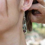 Handmade drop earrings featuring faceted garnet gemstones, by Art by any Means Jewelry
