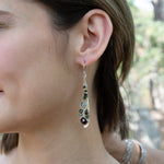 Handmade drop earrings featuring faceted garnet gemstones, by Art by any Means Jewelry