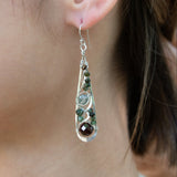 Handmade drop earrings featuring faceted garnet gemstones, by Art by any Means Jewelry