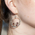 handmade sterling silver hoops with garnet faceted coins, gold-filled wire and darkened sterling silver twisted wire