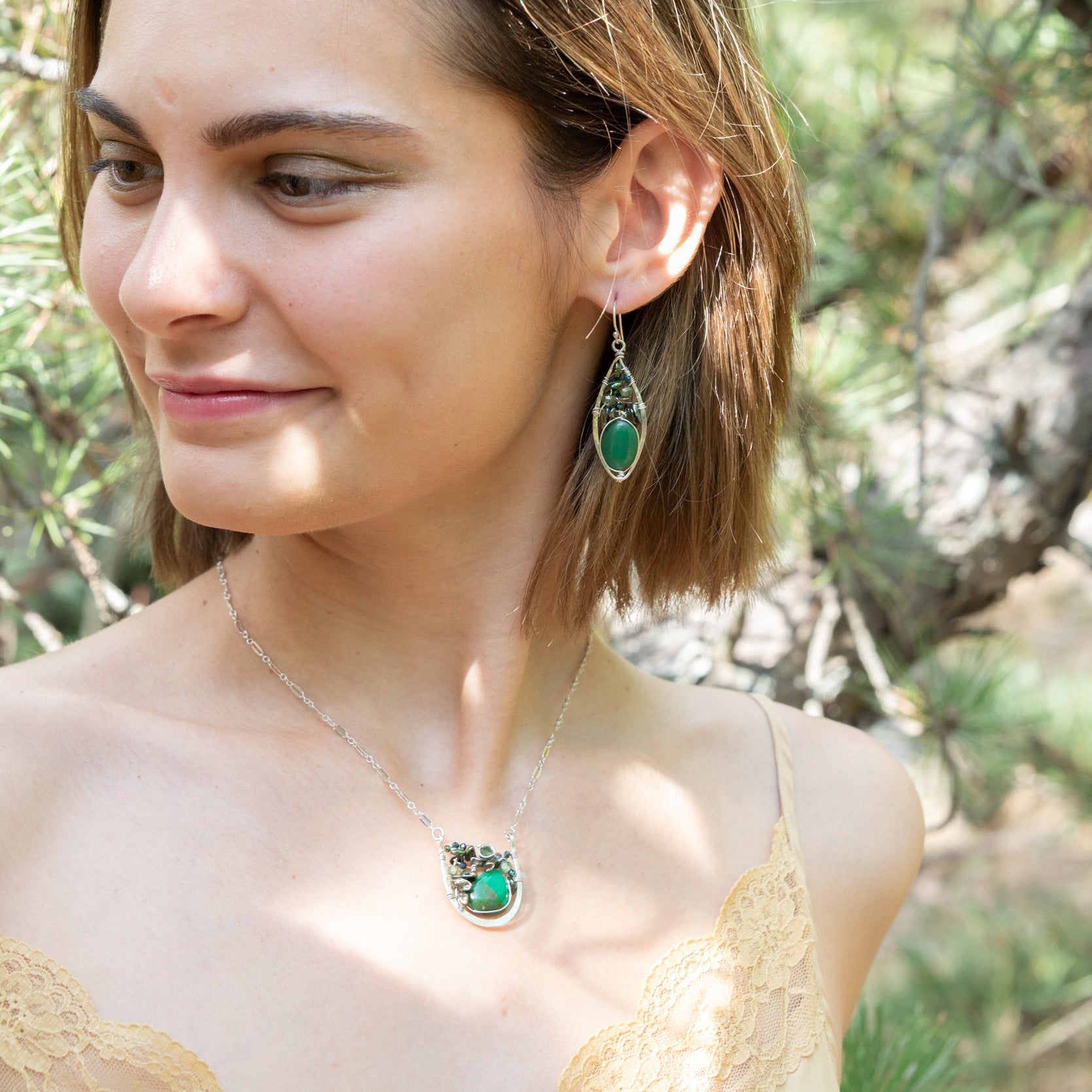 Handmade pendant necklace featuring a green aventurine gemstone in a buoy-inspired drop design, by Art by any Means Jewelry